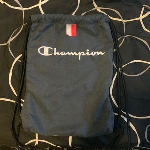 This is a Black, Red & White Athletic Champion Bag. It’s great for sports.